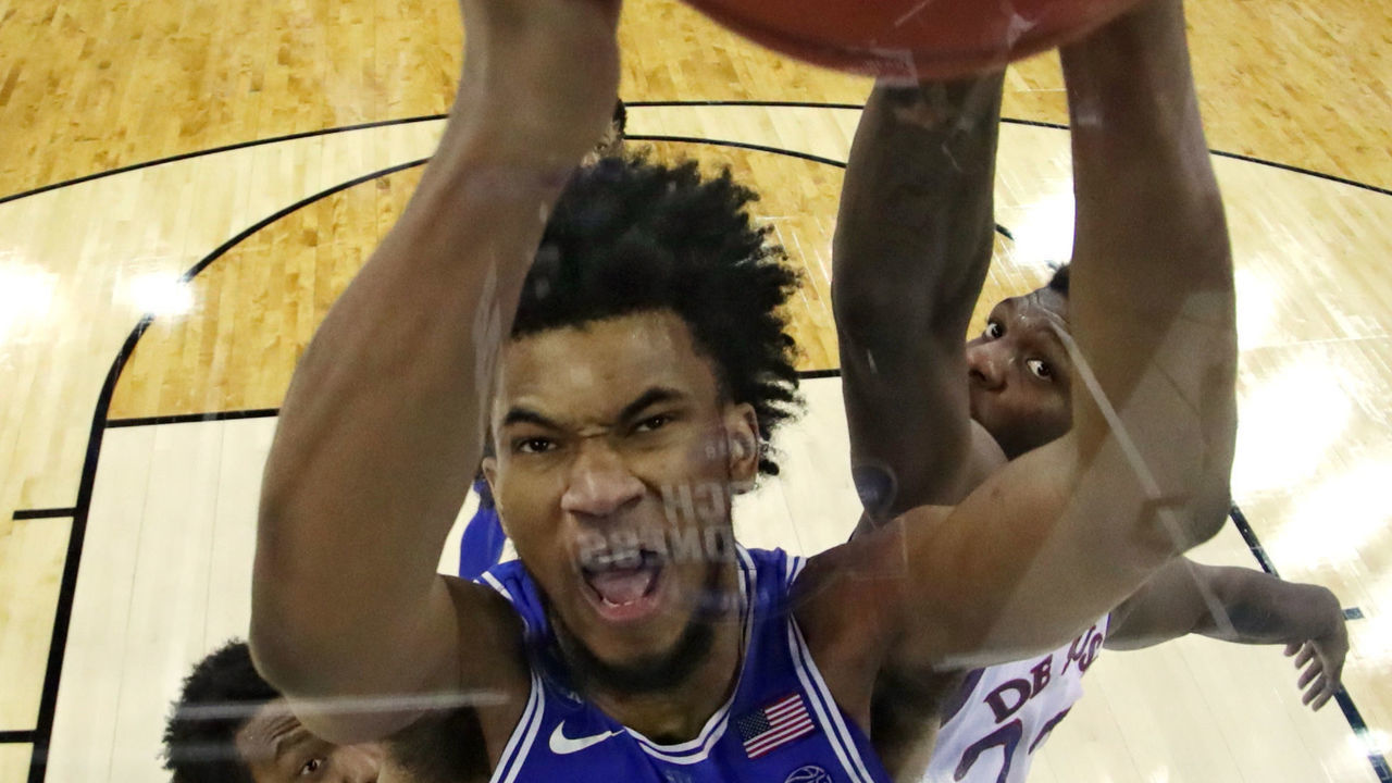 OMAHA, NE - MARCH 25: Marvin Bagley III #35 of the Duke Blue Devils grabs the rebound against Silvio De Sousa #22 of the Kansas Jayhawks in the 2018 NCAA Men's Basketball Tournament Midwest Regional at CenturyLink Center on March 25, 2018 in Omaha, Nebraska. The Kansas Jayhawks defeated the Duke Blue Devils 85-81.