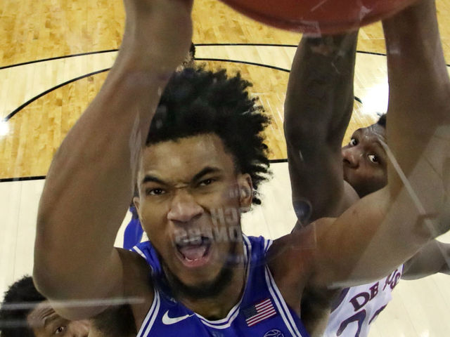 OMAHA, NE - MARCH 25: Marvin Bagley III #35 of the Duke Blue Devils grabs the rebound against Silvio De Sousa #22 of the Kansas Jayhawks in the 2018 NCAA Men's Basketball Tournament Midwest Regional at CenturyLink Center on March 25, 2018 in Omaha, Nebraska. The Kansas Jayhawks defeated the Duke Blue Devils 85-81.