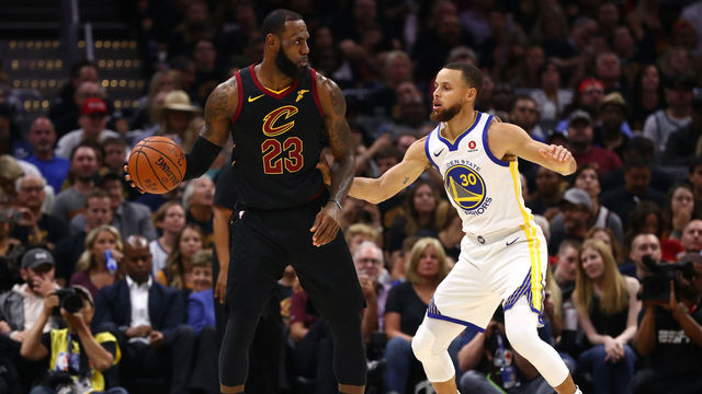 CLEVELAND, OH - JUNE 08: LeBron James #23 of the Cleveland Cavaliers handles the ball against Stephen Curry #30 of the Golden State Warriors in the first quarter during Game Four of the 2018 NBA Finals at Quicken Loans Arena on June 8, 2018 in Cleveland, Ohio.