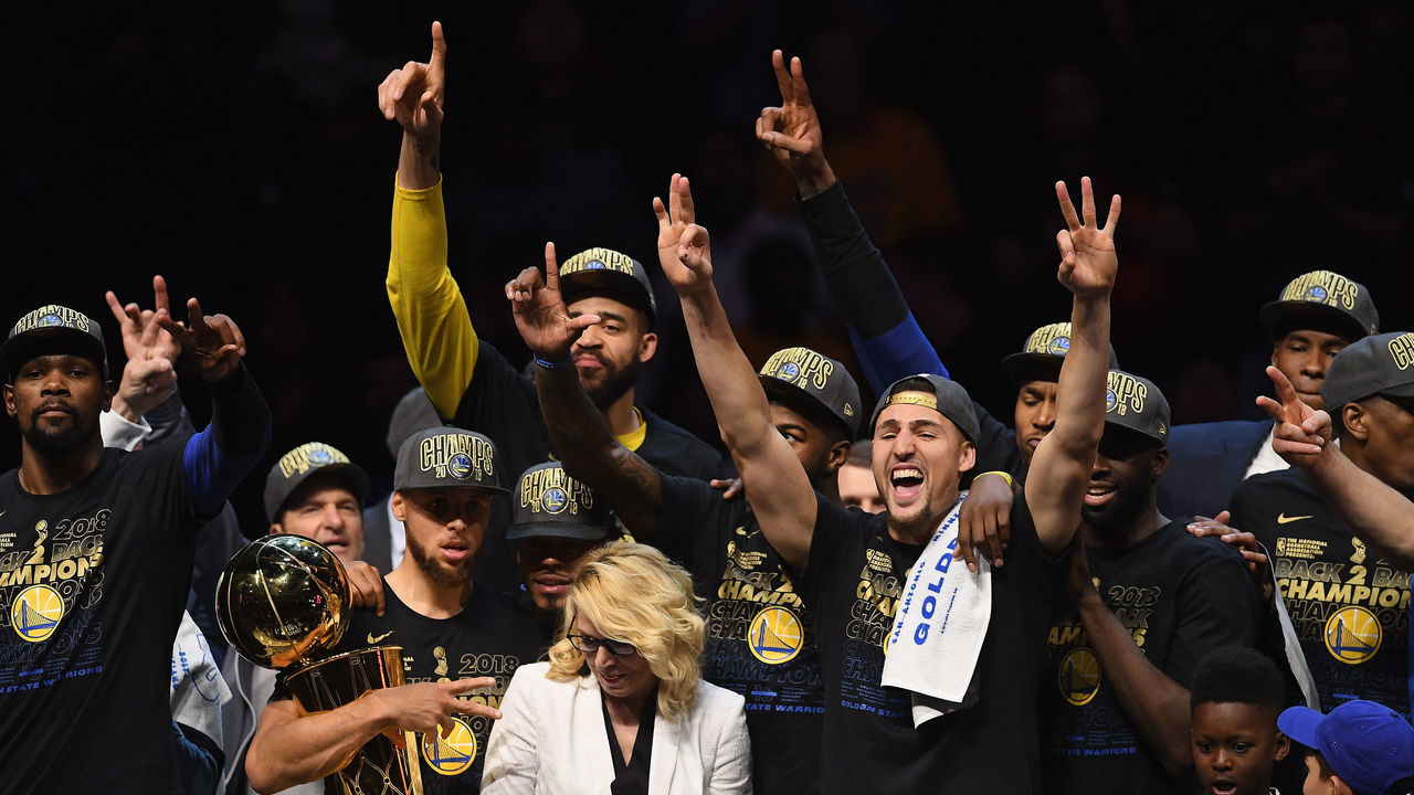 CLEVELAND, OH - JUNE 08: Kevin Durant #35 of the Golden State Warriors celebrates with the MVP trophy as Stephen Curry #30 celebrates with the Larry O'Brien Trophy after defeating the Cleveland Cavaliers during Game Four of the 2018 NBA Finals at Quicken Loans Arena on June 8, 2018 in Cleveland, Ohio. The Warriors defeated the Cavaliers 108-85 to win the 2018 NBA Finals.