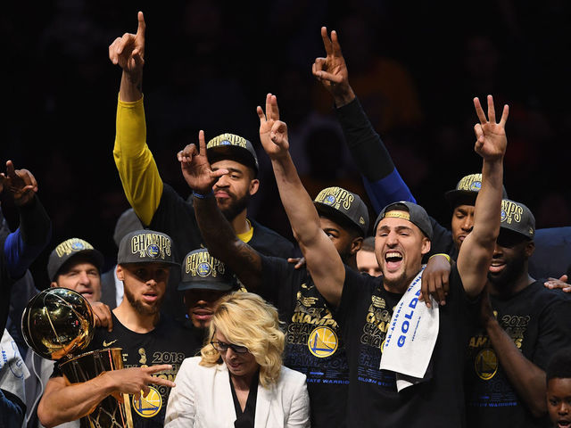 CLEVELAND, OH - JUNE 08: Kevin Durant #35 of the Golden State Warriors celebrates with the MVP trophy as Stephen Curry #30 celebrates with the Larry O'Brien Trophy after defeating the Cleveland Cavaliers during Game Four of the 2018 NBA Finals at Quicken Loans Arena on June 8, 2018 in Cleveland, Ohio. The Warriors defeated the Cavaliers 108-85 to win the 2018 NBA Finals.