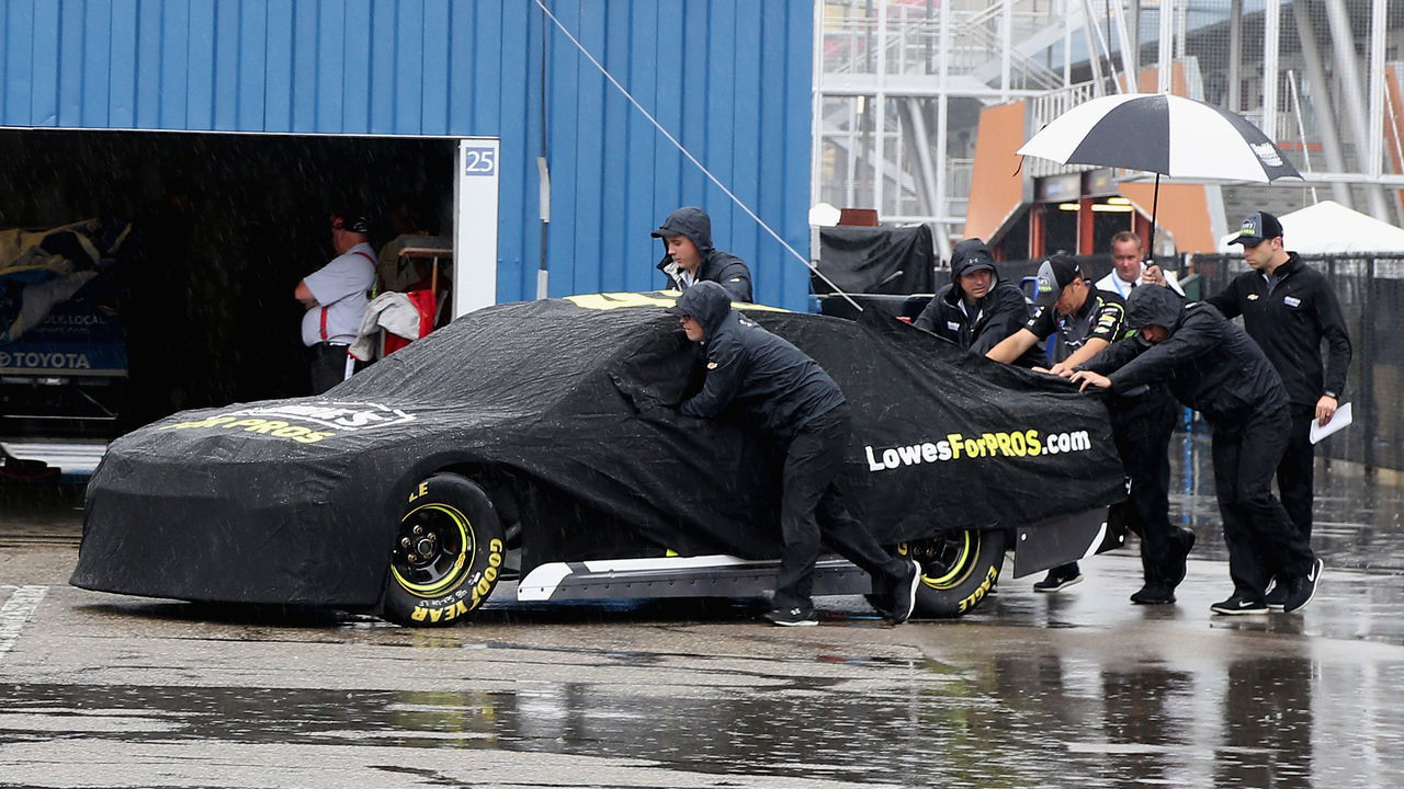 BROOKLYN, MI - JUNE 09: Jimmie Johnson, driver of the #48 Lowe's for Pros Chevrolet, has his car pushed through the garage during a rain delay for practice for the Monster Energy NASCAR Cup Series FireKeepers Casino 400 at Michigan International Speedway on June 9, 2018 in Brooklyn, Michigan.