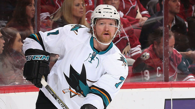 GLENDALE, AZ - NOVEMBER 01: Paul Martin #7 of the San Jose Sharks passes the puck during the first period of the NHL game against the Arizona Coyotes at Gila River Arena on November 1, 2016 in Glendale, Arizona.