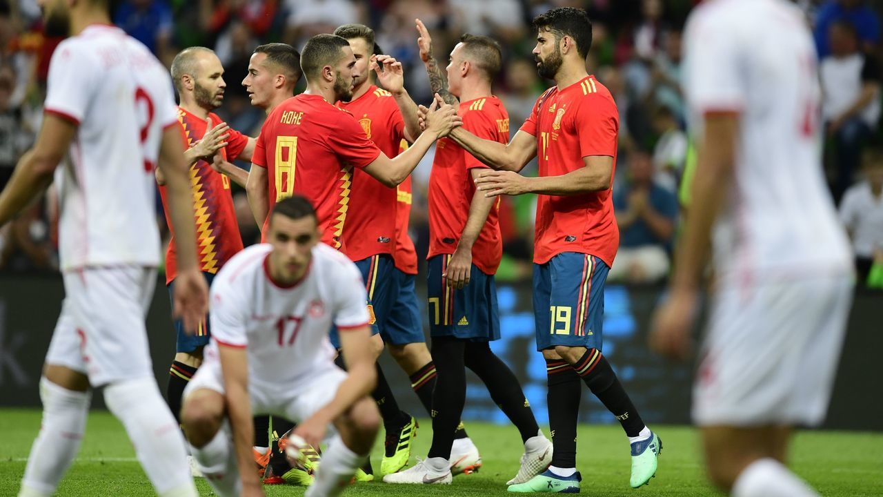 Spain's forward Iago Aspas (2nd R) celebrates with team mates after scoring a goal during the friendly football match between Spain and Tunisia at Krasnodar's stadium on June 9, 2018.