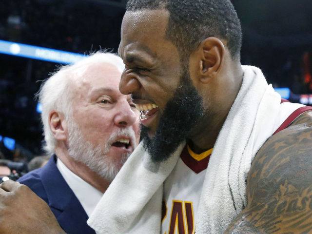 SAN ANTONIO,TX - JANUARY 23 : LeBron James #23 of the Cleveland Cavaliers is congratulated by Gregg Popovich head coach of the San Antonio Spurs at the end of the game at AT&T Center on January 23, 2018 in San Antonio, Texas. NOTE TO USER: User expressly acknowledges and agrees that , by downloading and or using this photograph, User is consenting to the terms and conditions of the Getty Images License Agreement.