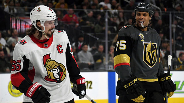 LAS VEGAS, NV - MARCH 02: Erik Karlsson #65 of the Ottawa Senators and Ryan Reaves #75 of the Vegas Golden Knights talk while waiting for a faceoff in the second period of their game at T-Mobile Arena on March 2, 2018 in Las Vegas, Nevada. The Senators won 5-4.