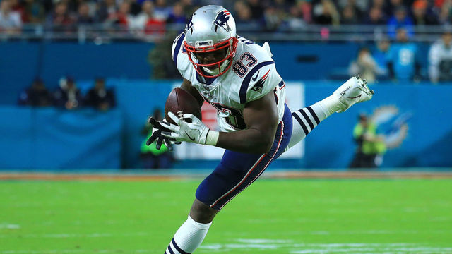 MIAMI GARDENS, FL - DECEMBER 11: Dwayne Allen #83 of the New England Patriots makes the catch during the second quarter against the Miami Dolphins at Hard Rock Stadium on December 11, 2017 in Miami Gardens, Florida.