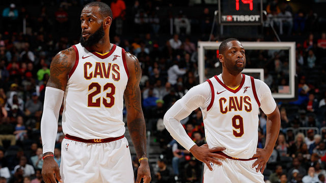 ATLANTA, GA - NOVEMBER 30: LeBron James #23 and Dwyane Wade #9 of the Cleveland Cavaliers look on during the game against the Atlanta Hawks at Philips Arena on November 30, 2017 in Atlanta, Georgia.