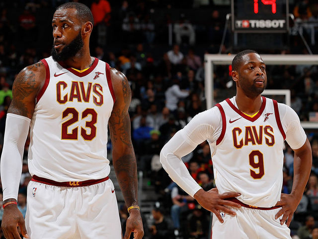 ATLANTA, GA - NOVEMBER 30: LeBron James #23 and Dwyane Wade #9 of the Cleveland Cavaliers look on during the game against the Atlanta Hawks at Philips Arena on November 30, 2017 in Atlanta, Georgia.