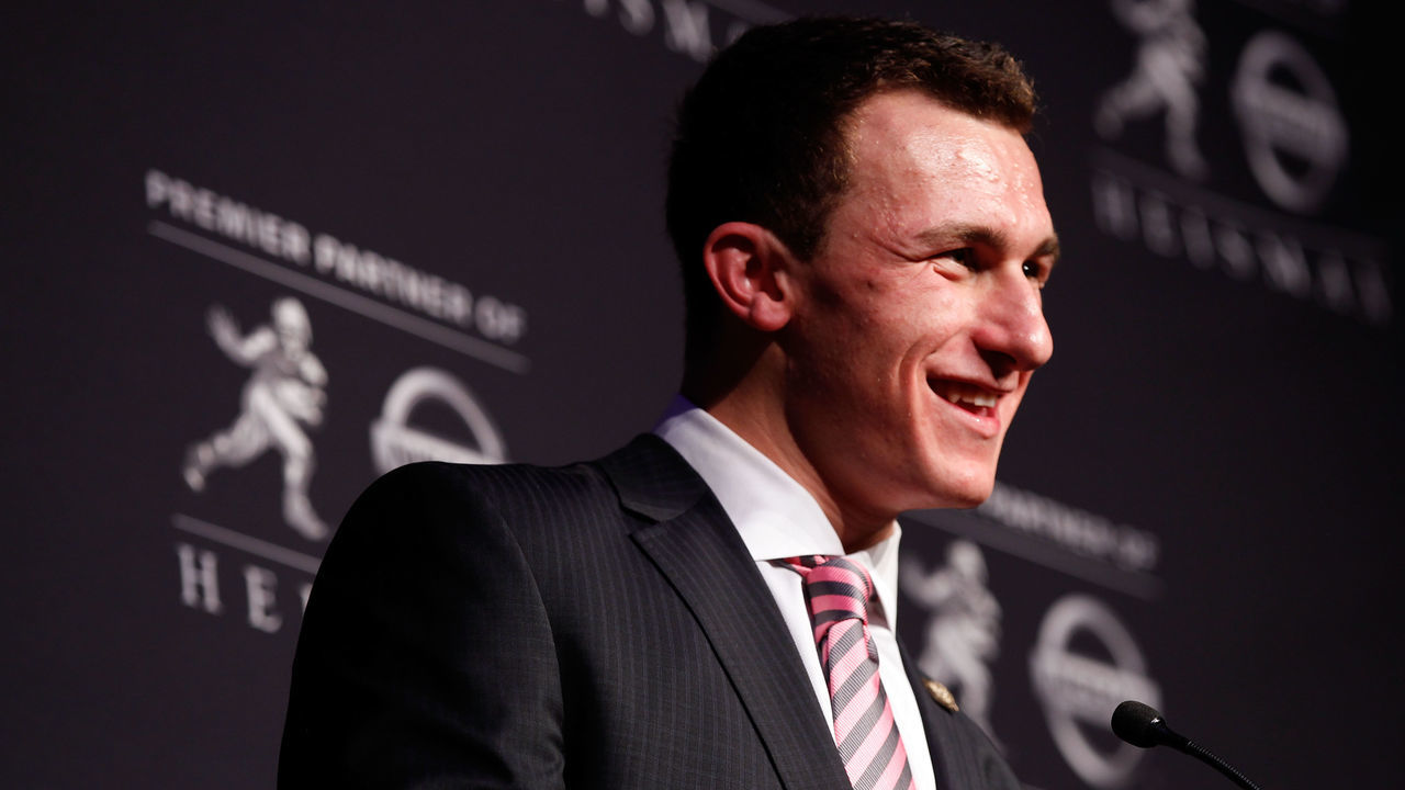 NEW YORK, NY - DECEMBER 08: Quarterback Johnny Manziel of the Texas A&M University Aggies speaks after being named the 78th Heisman Memorial Trophy Award winner at a press conference at the Marriott Marquis on December 8, 2012 in New York City.