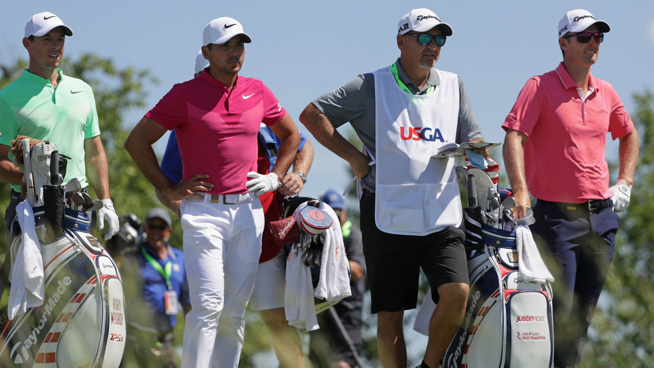 HARTFORD, WI - JUNE 15: Rory McIlroy of Northern Ireland (L), Jason Day of Australia (C), and Justin Rose of England wait at the 14th tee during the first round of the 2017 U.S. Open at Erin Hills on June 15, 2017 in Hartford, Wisconsin.