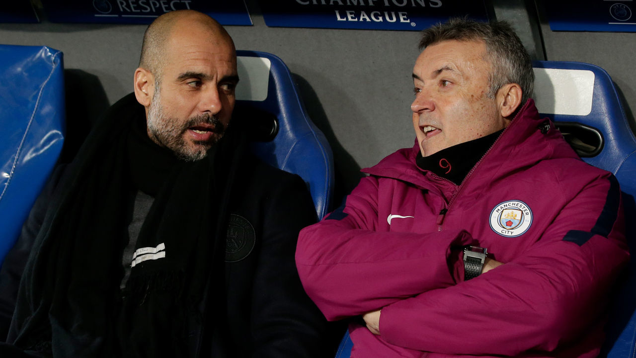 BASEL, SWITZERLAND - FEBRUARY 13: (L-R) coach Josep Guardiola of Manchester City, Domenec Torrent of Manchester City during the UEFA Champions League match between Fc Basel v Manchester City at the St. Jakob-Park on February 13, 2018 in Basel Switzerland