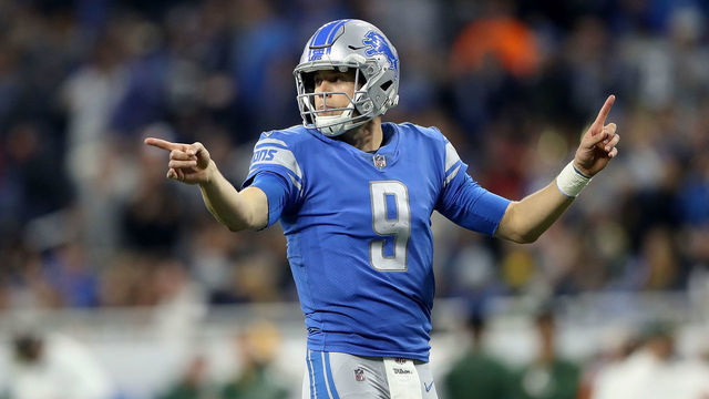 DETROIT, MI - DECEMBER 31: Quarterback Matthew Stafford #9 of the Detroit Lions signals to his team against the Green Bay Packers during the second half at Ford Field on December 31, 2017 in Detroit, Michigan.