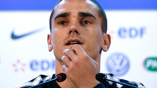 France's forward Antoine Griezmann gestures as he speaks during a press conference at the press center in Istra, western Moscow on June 12, 2018, ahead of the Russia 2018 World Cup football tournament.