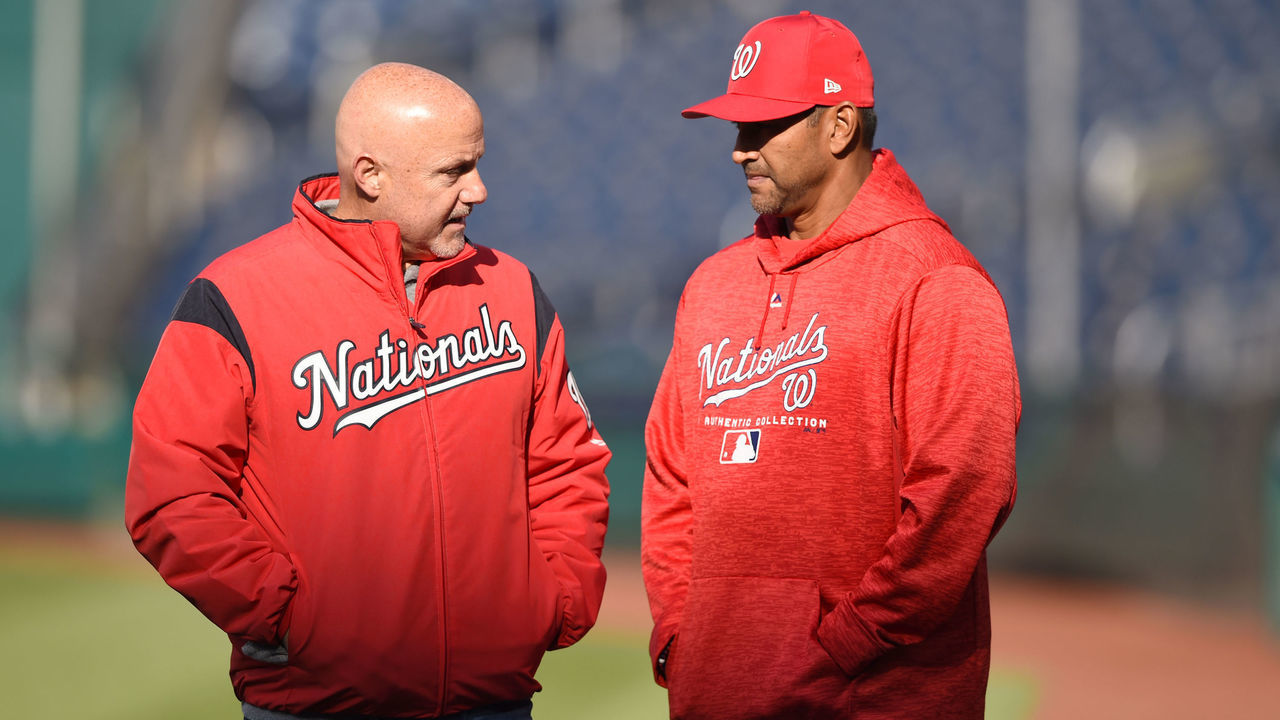 WASHINGTON, DC - APRIL 10: General manager Mike Rizzo and manager Dave Martinez #4 of the Washington Nationals talk during batting practice of a baseball game against the Atlanta Braves at Nationals Park on April 10, 2018 in Washington, DC.