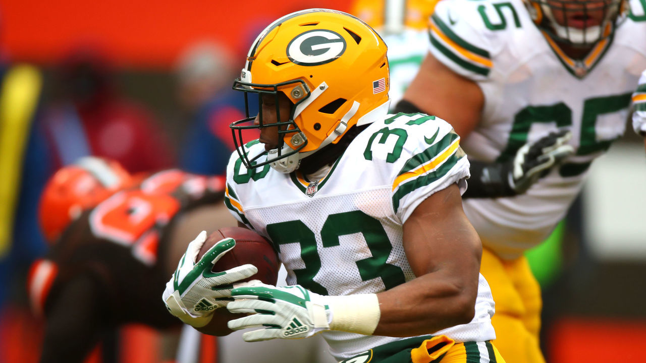 CLEVELAND, OH - DECEMBER 10: Aaron Jones #33 of the Green Bay Packers runs the ball in the second quarter against the Cleveland Browns at FirstEnergy Stadium on December 10, 2017 in Cleveland, Ohio.