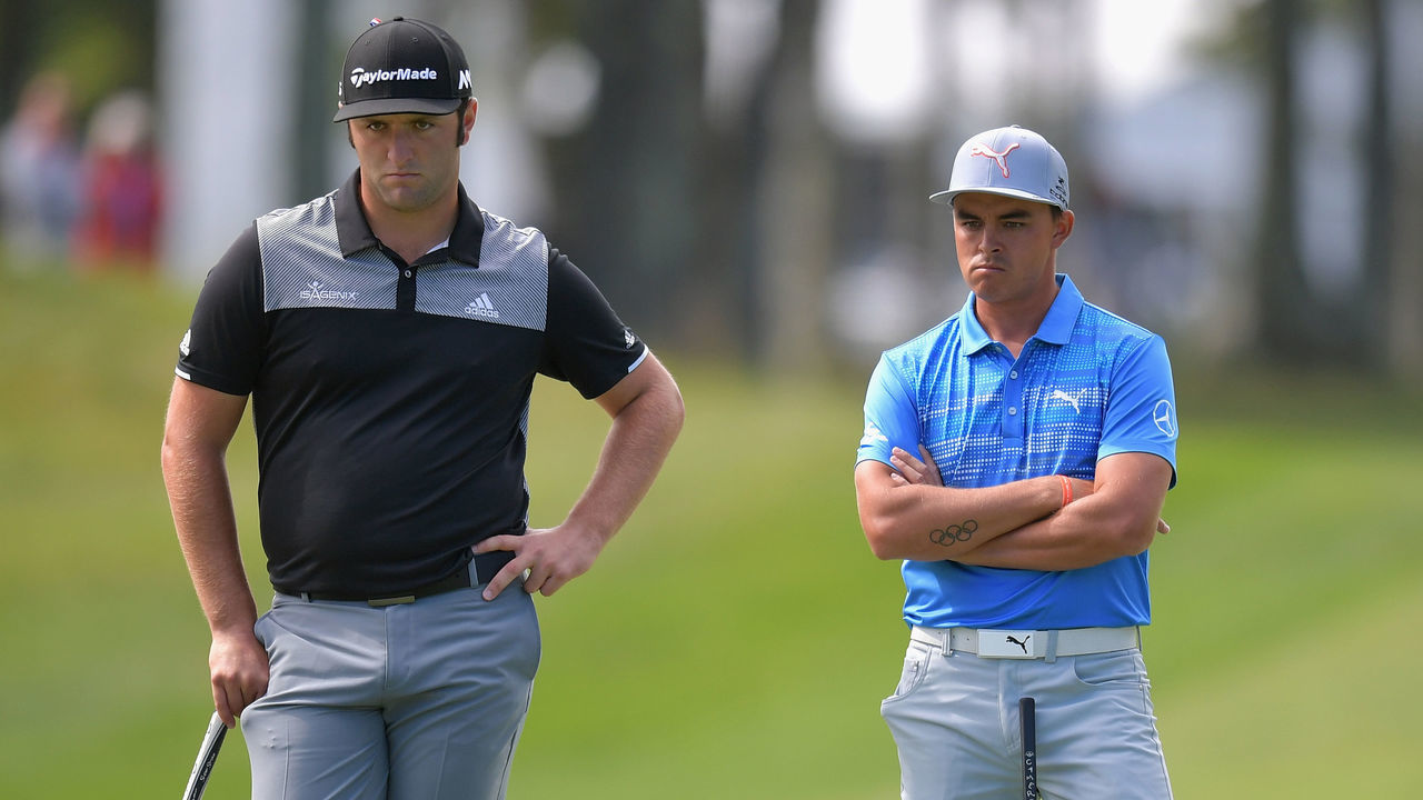 NORTON, MA - SEPTEMBER 02: Jon Rahm of Spain and Rickie Fowler of the United States stand on the 15th green during round two of the Dell Technologies Championship at TPC Boston on September 2, 2017 in Norton, Massachusetts.