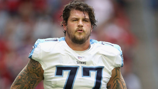 GLENDALE, AZ - DECEMBER 10: Offensive tackle Taylor Lewan #77 of the Tennessee Titans walks on the field during the first half of the NFL game against the Arizona Cardinals at the University of Phoenix Stadium on December 10, 2017 in Glendale, Arizona. The Cardinals defeated the Titans 12-7.