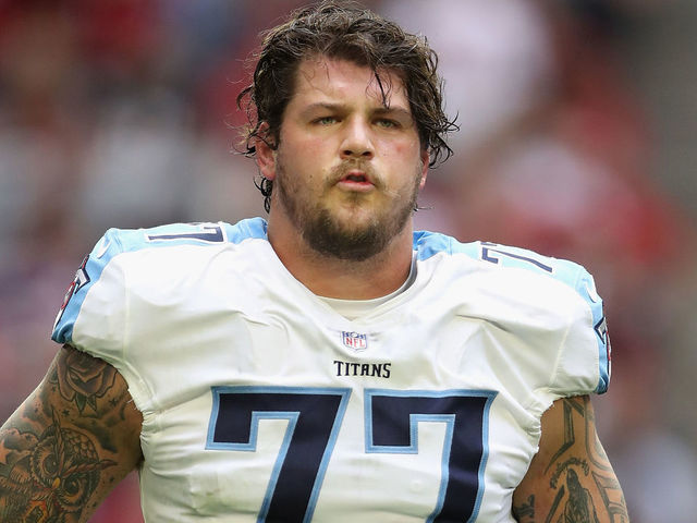 Tennessee Titans offensive tackle Taylor Lewan (77) plays in an