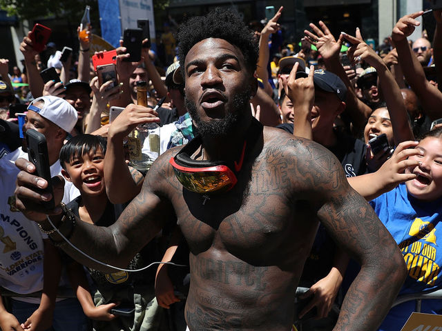 OAKLAND, CA - JUNE 12: Jordan Bell #2 of the Golden State Warriors celebrates during the Golden State Warriors Victory Parade on June 12, 2018 in Oakland, California. The Golden State Warriors beat the Cleveland Cavaliers 4-0 to win the 2018 NBA Finals.