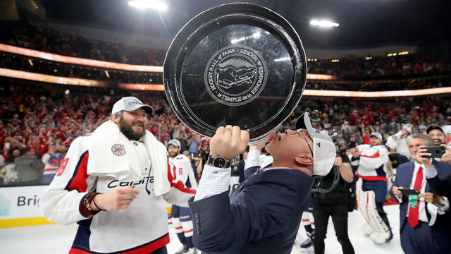 LAS VEGAS, NV - JUNE 07: Head coach Barry Trotz of the Washington Capitals hoists the Stanley Cup after his team defeated the Vegas Golden Knights 4-3 in Game Five of the 2018 NHL Stanley Cup Final at T-Mobile Arena on June 7, 2018 in Las Vegas, Nevada.