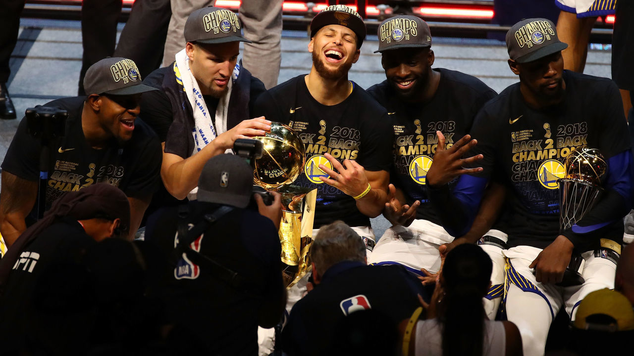 CLEVELAND, OH - JUNE 08: Andre Iguodala #9, Klay Thompson #11, Stephen Curry #30, Draymond Green #23 and Kevin Durant #35 of the Golden State Warriors celebrate after defeating the Cleveland Cavaliers during Game Four of the 2018 NBA Finals at Quicken Loans Arena on June 8, 2018 in Cleveland, Ohio. The Warriors defeated the Cavaliers 108-85 to win the 2018 NBA Finals.