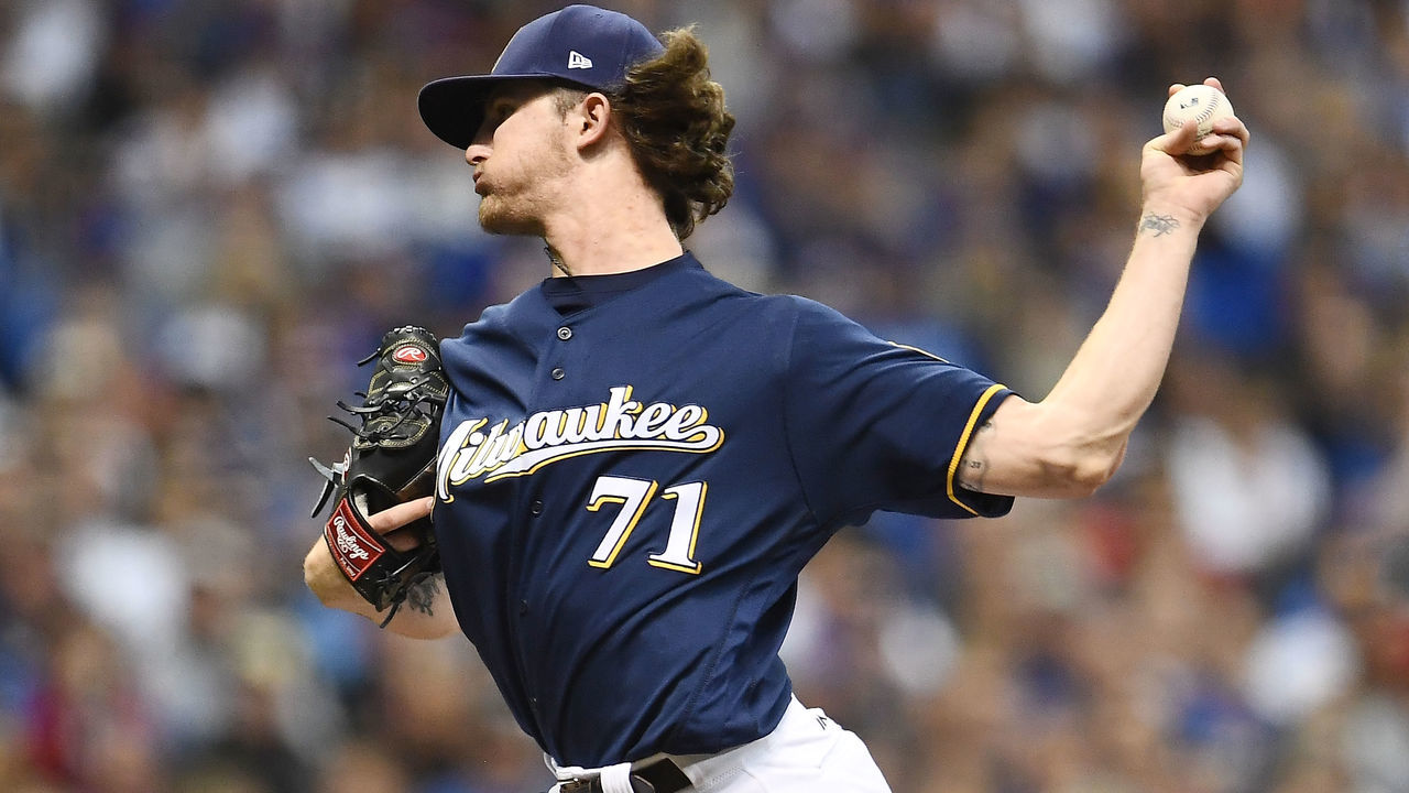 MILWAUKEE, WI - JUNE 11: Josh Hader #71 of the Milwaukee Brewers throws a pitch during the seventh inning of a game against the Chicago Cubs at Miller Park on June 11, 2018 in Milwaukee, Wisconsin.