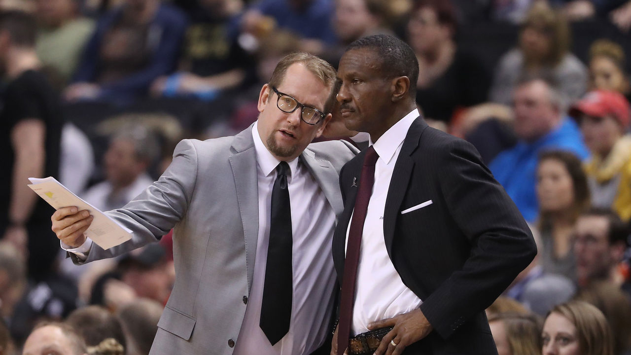TORONTO, ON - FEBRUARY 15: Head coach Dwane Casey of the Toronto Raptors listens to assistant coach Nick Nurse against the Charlotte Hornets during NBA game action at Air Canada Centre on February 15, 2017 in Toronto, Canada.