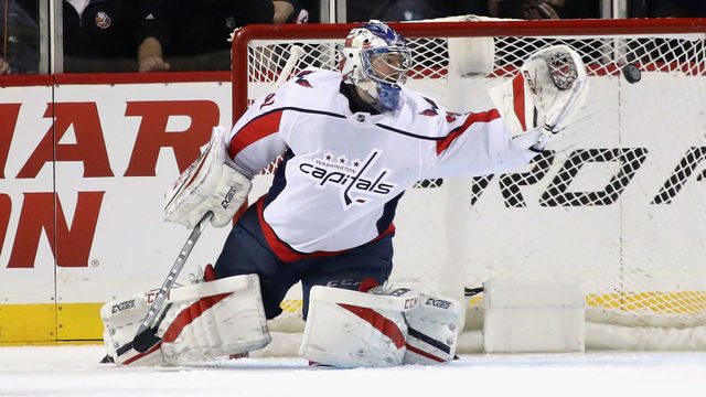 NEW YORK, NY - MARCH 15: Philipp Grubauer #31 of the Washington Capitals makes the first period save against the New York Islanders at the Barclays Center on March 15, 2018 in the Brooklyn borough of New York City.