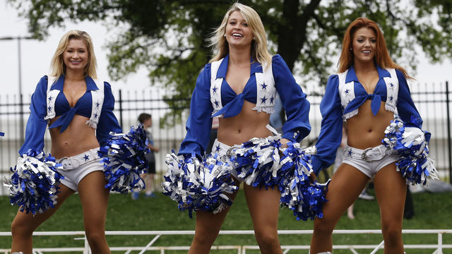 DALLAS, TX - MARCH 25: The Dallas Cowboys Cheerleaders perfom near the finish line during the Toyota Rock 'N' Roll Dallas Half Marathon on March 25, 2018 in Dallas, Texas.