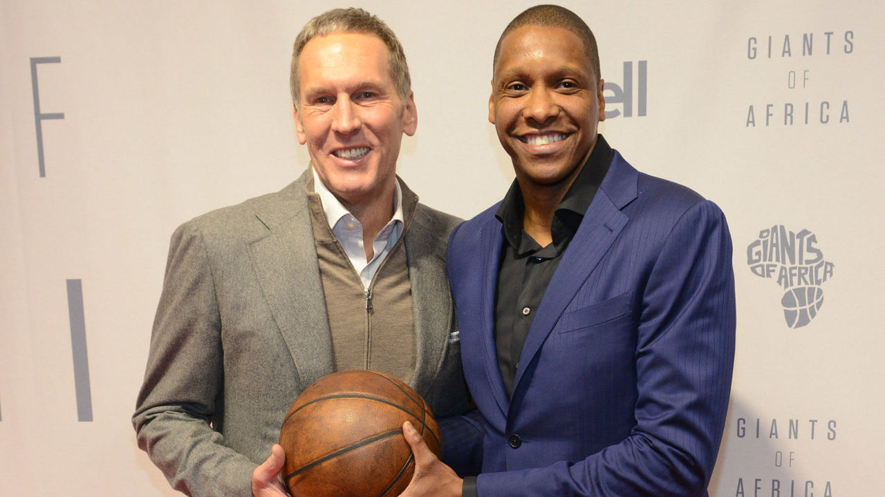 TORONTO, ON - FEBRUARY 11: Former President and General Manager of the Toronto Raptors Bryan Colangelo and General Manager of the Toronto Raptors Masai Ujiri attend 'Giants of Africa' screening at TIFF Bell Lightbox on February 11, 2016 in Toronto, Canada.