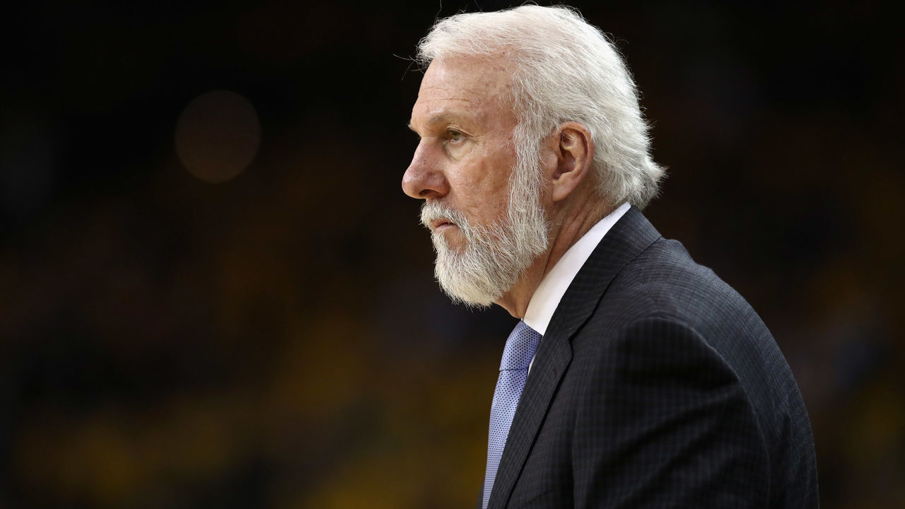OAKLAND, CA - APRIL 16: Head coach Gregg Popovich of the San Antonio Spurs stands on the side of the court during their game against the Golden State Warriors during Game 2 of Round 1 of the 2018 NBA Playoffs at ORACLE Arena on April 16, 2018 in Oakland, California.