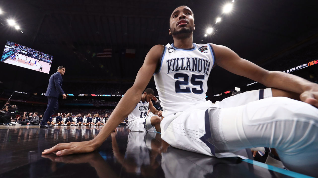 SAN ANTONIO, TX - MARCH 31: Mikal Bridges #25 of the Villanova Wildcats looks on from the bench in the first half against the Kansas Jayhawks during the 2018 NCAA Men's Final Four Semifinal at the Alamodome on March 31, 2018 in San Antonio, Texas.