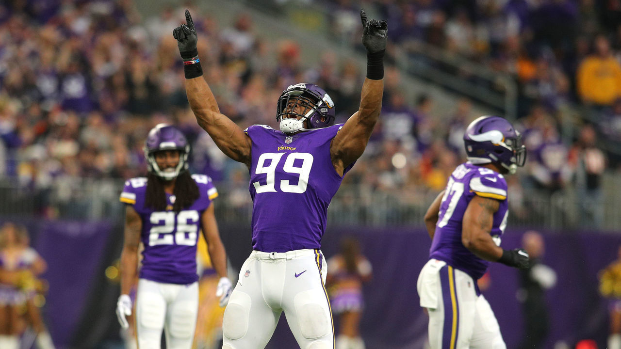 MINNEAPOLIS, MN - DECEMBER 17: Danielle Hunter #99 of the Minnesota Vikings celebrates after sacking Andy Dalton #14 of the Cincinnati Bengals in the second quarter of the game on December 17, 2017 at U.S. Bank Stadium in Minneapolis, Minnesota.