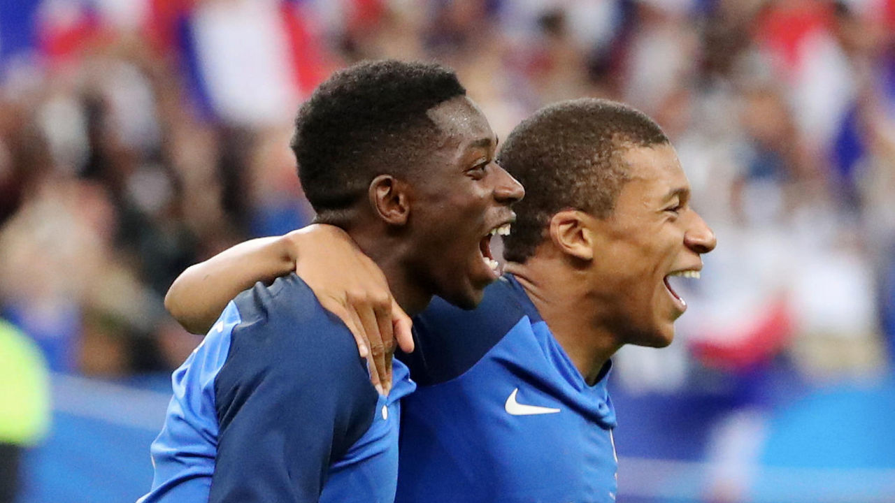 PARIS, FRANCE - JUNE 13: Ousmane Dembele #11 of France celebrate his goal with Kylian Mbappe during the International Friendly match between France and England at Stade de France on June 13, 2017 in Paris, France.