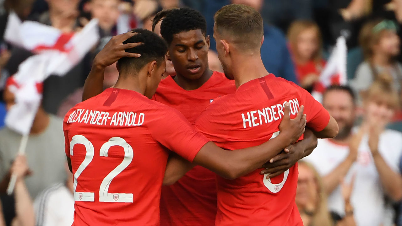England's striker Marcus Rashford (C) celebrates with teammates after scoring the opening goal during the International friendly football match between England and Costa Rica at Elland Road, Leeds in northern England on June 7, 2018. - England won the game 2-0.