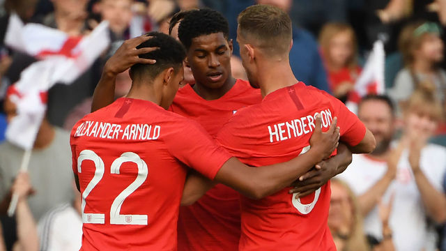 England's striker Marcus Rashford (C) celebrates with teammates after scoring the opening goal during the International friendly football match between England and Costa Rica at Elland Road, Leeds in northern England on June 7, 2018. - England won the game 2-0.