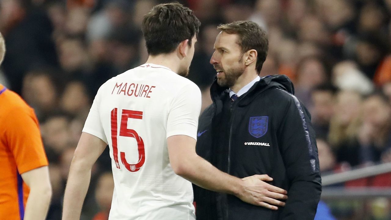 (L-R) Harry Maguire of England, coach Gareth Southgate of England during the International friendly match match between The Netherlands and England at the Amsterdam Arena on March 23, 2018 in Amsterdam, The Netherlands
