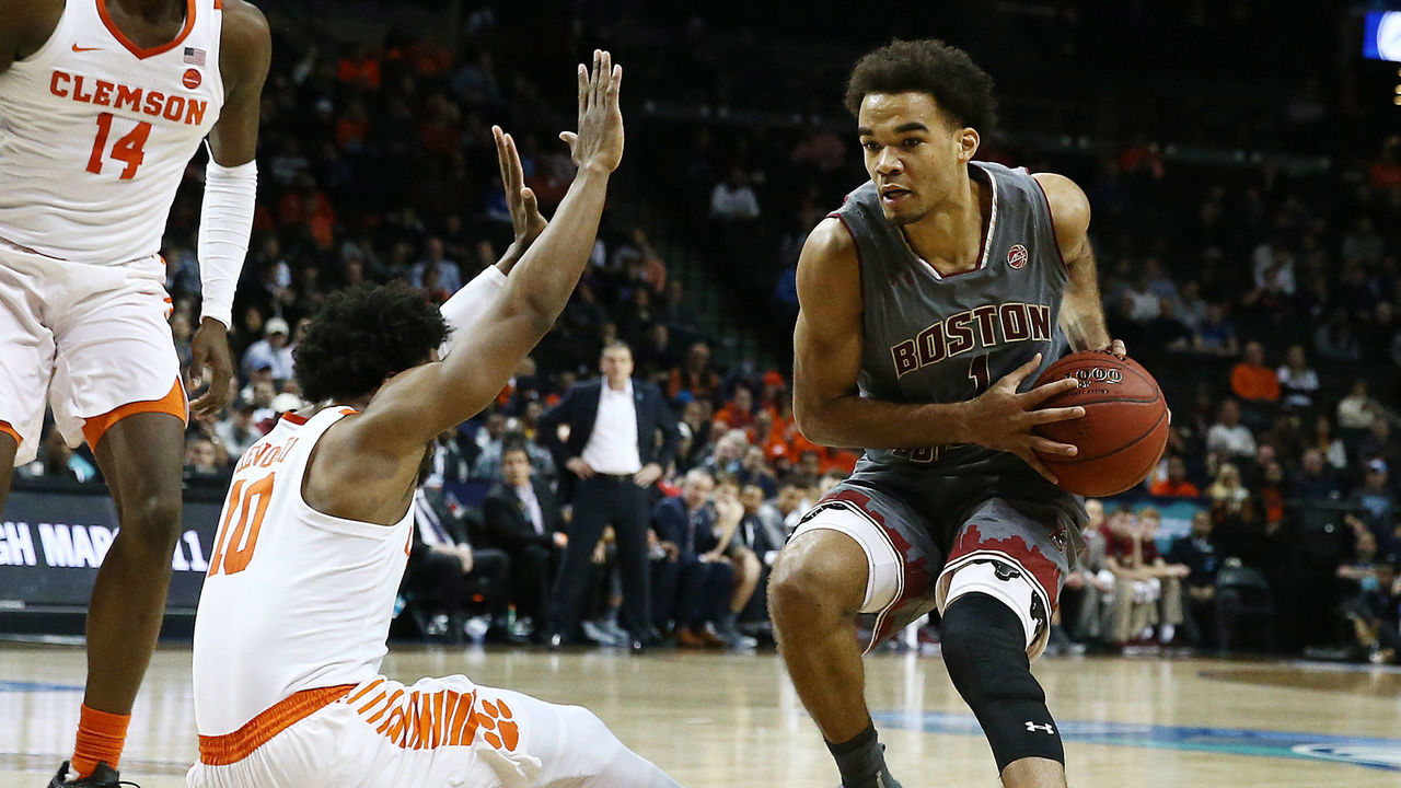 NEW YORK, NY - MARCH 08: Jerome Robinson #1 of the Boston College Eagles dribbles against Gabe DeVoe #10 of the Clemson Tigers during the quarterfinals of the ACC Men's Basketball Tournament at the Barclays Center on March 8, 2018 in New York City.