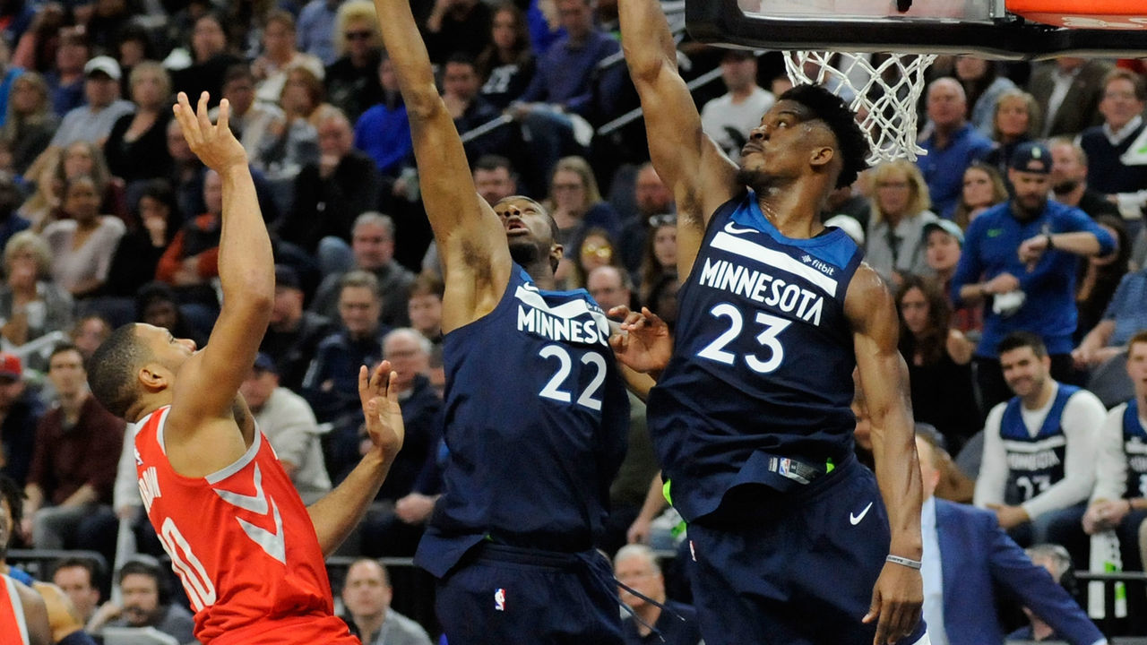 MINNEAPOLIS, MN - APRIL 21: Andrew Wiggins #22 and Jimmy Butler #23 of the Minnesota Timberwolves block a shot by Eric Gordon #10 of the Houston Rockets during the fourth quarter in Game Three of Round One of the 2018 NBA Playoffs on April 21, 2018 at the Target Center in Minneapolis, Minnesota. The Timberwolves defeated 121-105.
