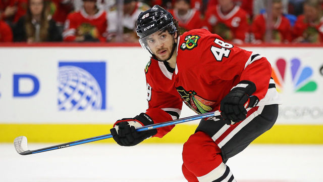 CHICAGO, IL - DECEMBER 08: Vinnie Hinostroza #48 of the Chicago Blackhawks skates against the Buffalo Sabres at the United Center on December 8, 2017 in Chicago, Illinois. The Blackhawks defeated the Sabres 3-2 in a shootout.