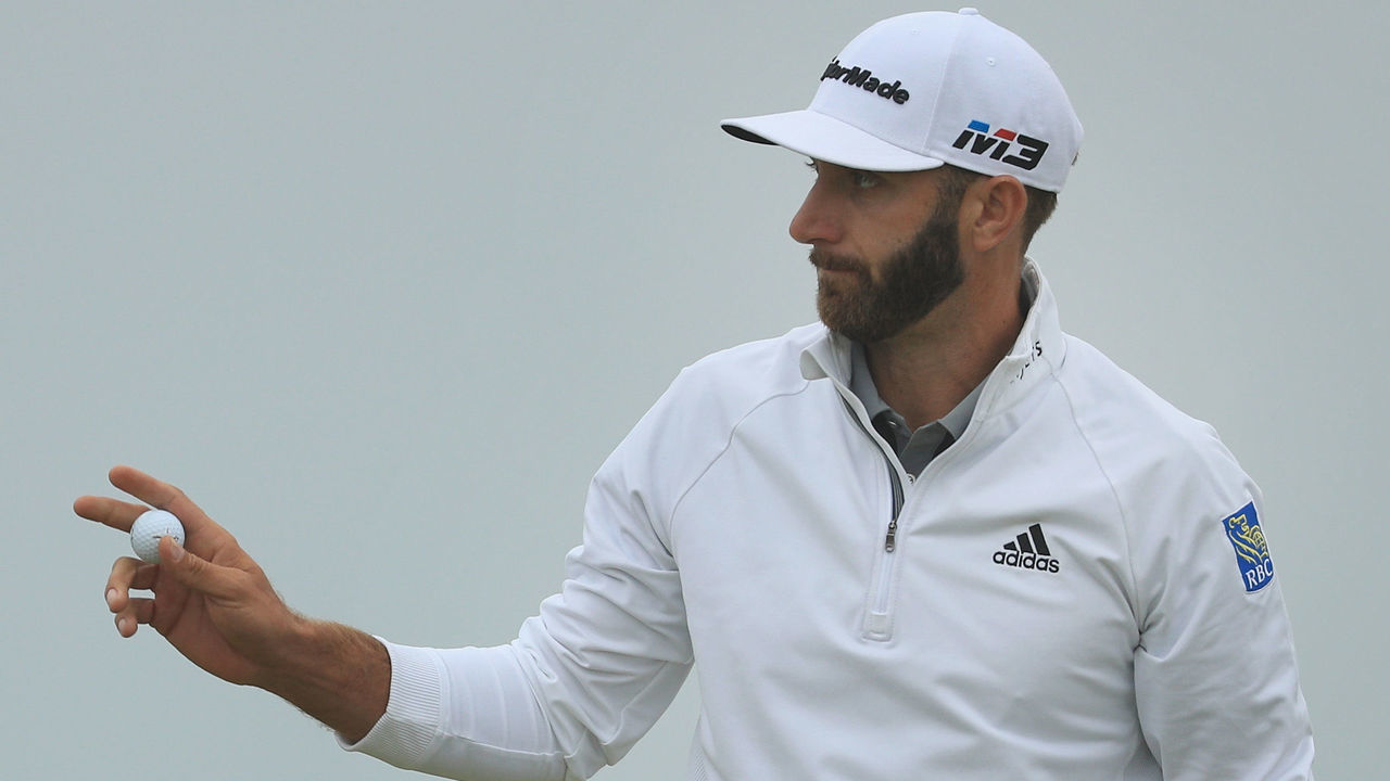 SOUTHAMPTON, NY - JUNE 15: Dustin Johnson of the United States waves on the 13th green during the second round of the 2018 U.S. Open at Shinnecock Hills Golf Club on June 15, 2018 in Southampton, New York.