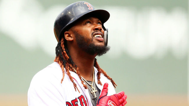 BOSTON, MA - APRIL 14: Hanley Ramirez #13 of the Boston Red Sox reacts as he crosses home plate after hitting a two-run home run in the first inning of a game against the Baltimore Orioles at Fenway Park on April 14, 2018 in Boston, Massachusetts.