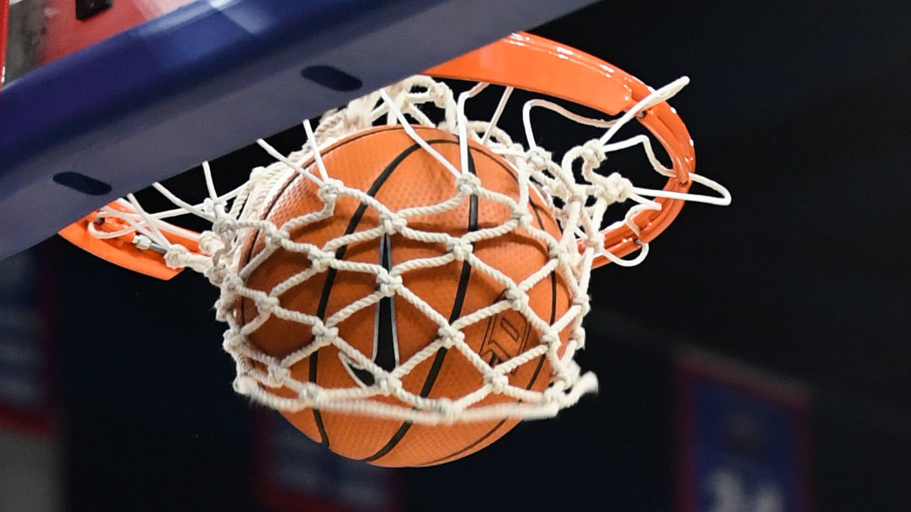 CHICAGO, IL - DECEMBER 21: A general stock view of a basketball going through a net during a game between the Miami (Oh) Redhawks and the DePaul Blue Demons on December 21, 2017, at the Wintrust Arena in Chicago, IL.