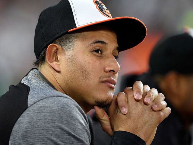 BALTIMORE, MD - JUNE 11: Manny Machado #13 of the Baltimore Orioles watches the game in the seventh inning against the Boston Red Sox at Oriole Park at Camden Yards on June 11, 2018 in Baltimore, Maryland.