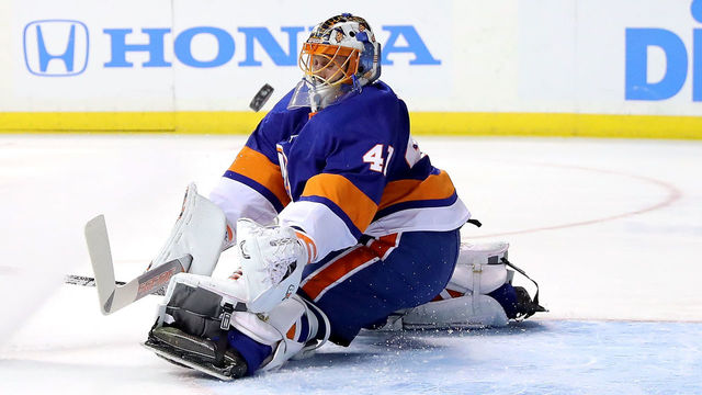 NEW YORK, NY - FEBRUARY 13: Jaroslav Halak #41 of the New York Islanders blocks a shot by Josh Anderson #77 of the Columbus Blue Jackets in the first period during their game at Barclays Center on February 13, 2018 in the Brooklyn borough of New York City.