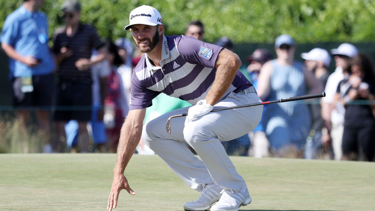 SOUTHAMPTON, NY - JUNE 16: Dustin Johnson of the United States lines up a putt on the sixth green during the third round of the 2018 U.S. Open at Shinnecock Hills Golf Club on June 16, 2018 in Southampton, New York.