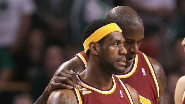 BOSTON - MAY 07: LeBron James #23, Shaquille O'Neal #33 and Anthony Parker #18 of the Cleveland Cavaliers take a breather during a game against the Boston Celtics during Game Three of the Eastern Conference Semifinals during the 2010 NBA Playoffs at TD Banknorth Garden on May 7, 2010 in Boston, Massachusetts.