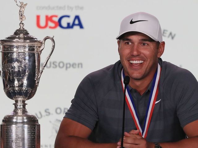 SOUTHAMPTON, NY - JUNE 17: Brooks Koepka of the United States speaks to the media after winning the 2018 U.S. Open at Shinnecock Hills Golf Club on June 17, 2018 in Southampton, New York.