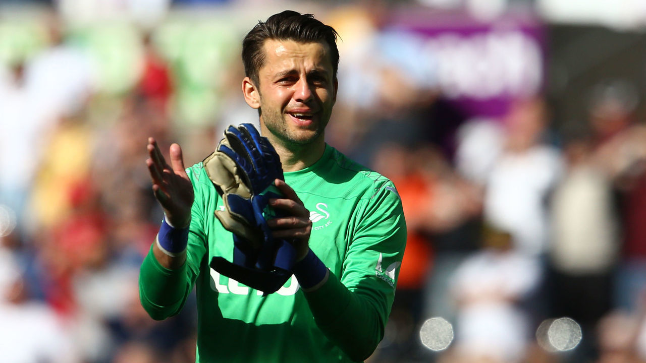 Swansea City's Polish goalkeeper Lukasz Fabianski reacts after losing the English Premier League football match between Swansea City and Stoke City at The Liberty Stadium in Swansea, south Wales on May 13, 2018.